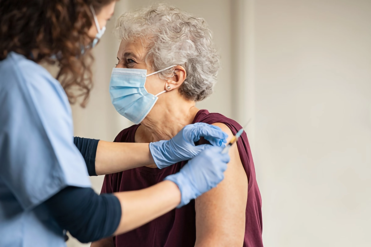 a patient receiving a vaccination